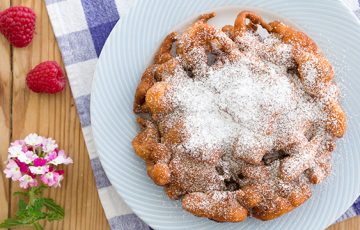 Make Churro Funnel Cake for a cinnamon twist on a favorite American pastry.