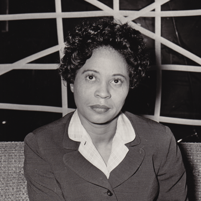 Young woman (Daisy Bates) looking into camera