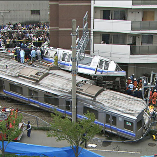 Site of Amagasaki train crash with emergency services