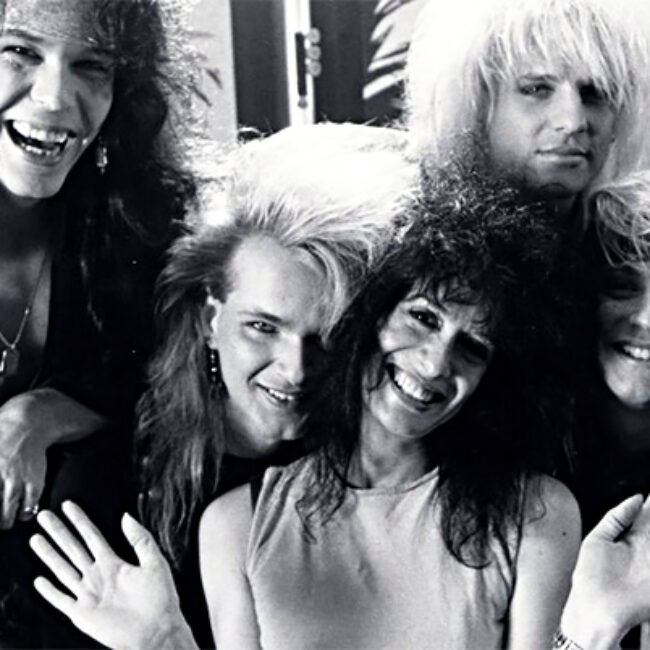 Filmmaker Penelope Spheeris surrounded by Poison (the band), in Decline of Western Civilization III the Metal Years