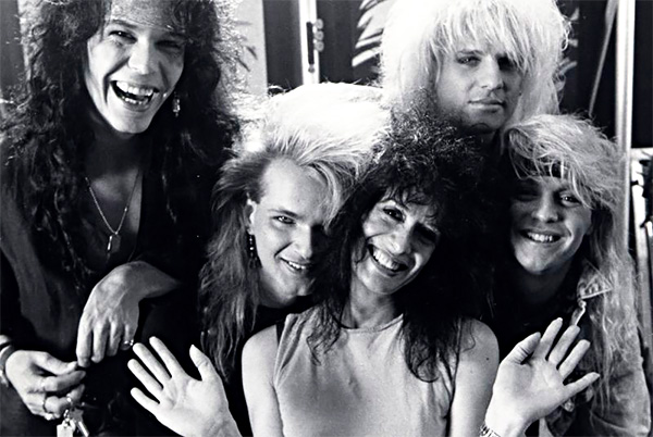 Filmmaker Penelope Spheeris surrounded by Poison (the band), in Decline of Western Civilization III the Metal Years