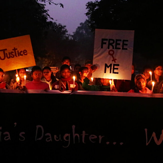 rape protesters in India hold a candle-lit vigil