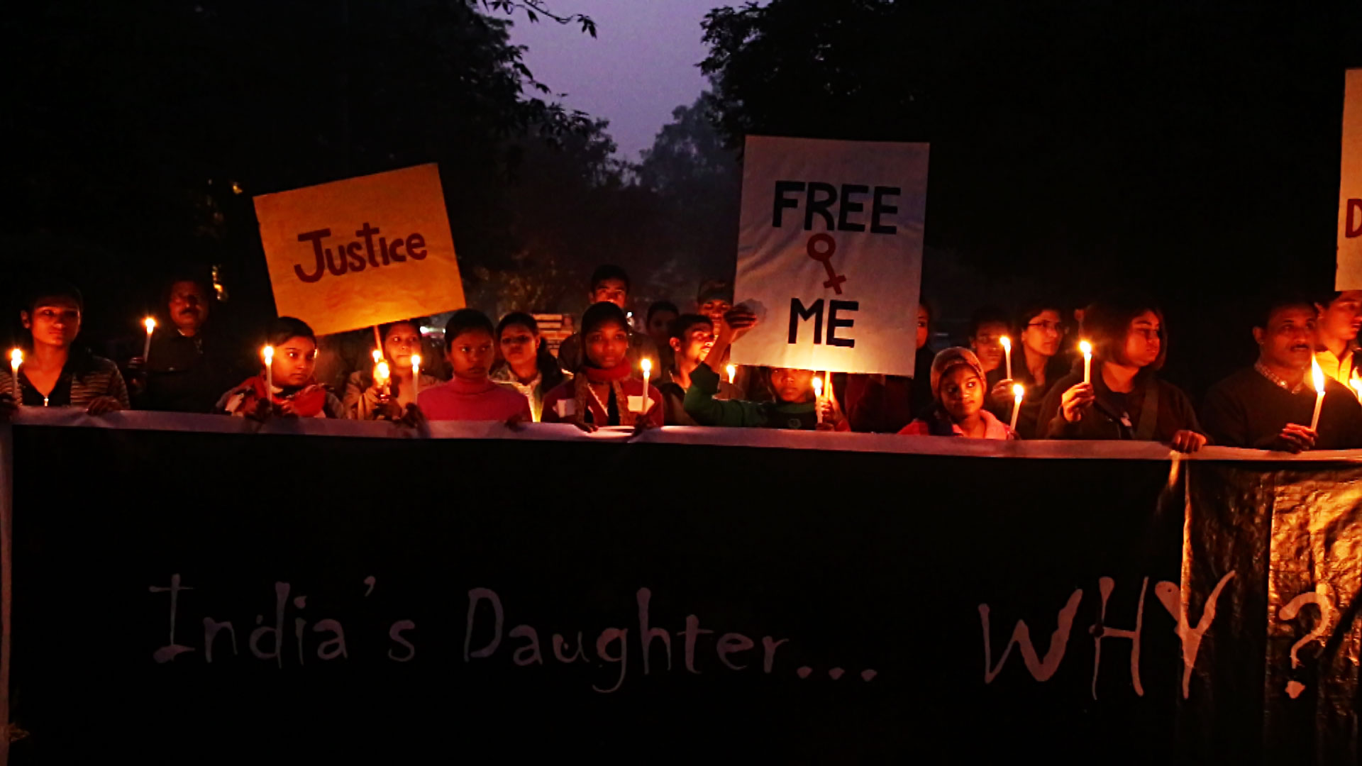 rape protesters in India hold a candle-lit vigil