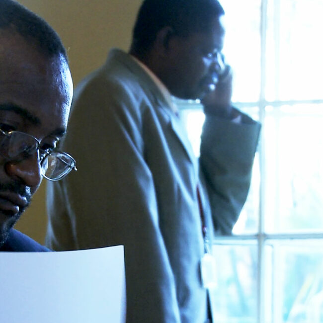 Douglas Mwonzora and Paul Mangwana (l-r) during a meeting about ratifying the new Zimbabwe constitution