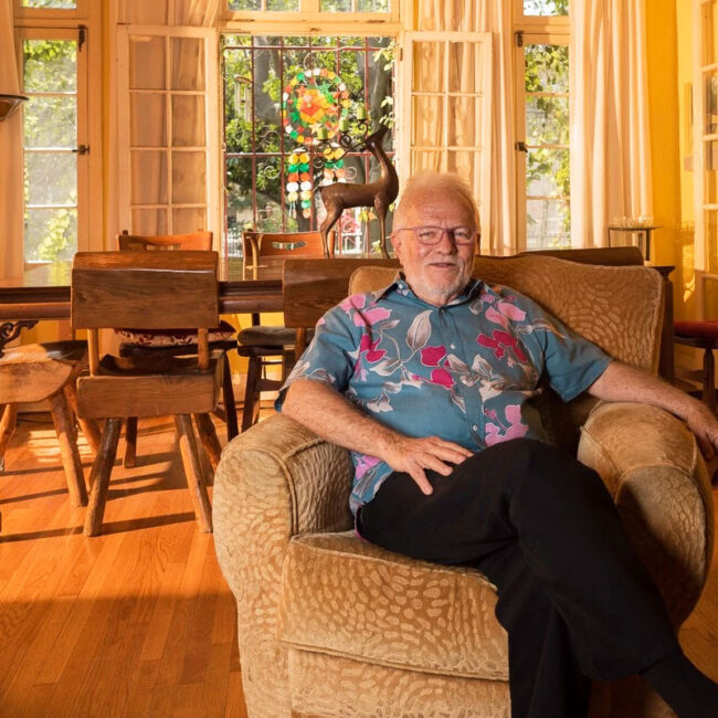 Tony Sullivan in the living room of the home he shared with late partner Richard Adams for decades