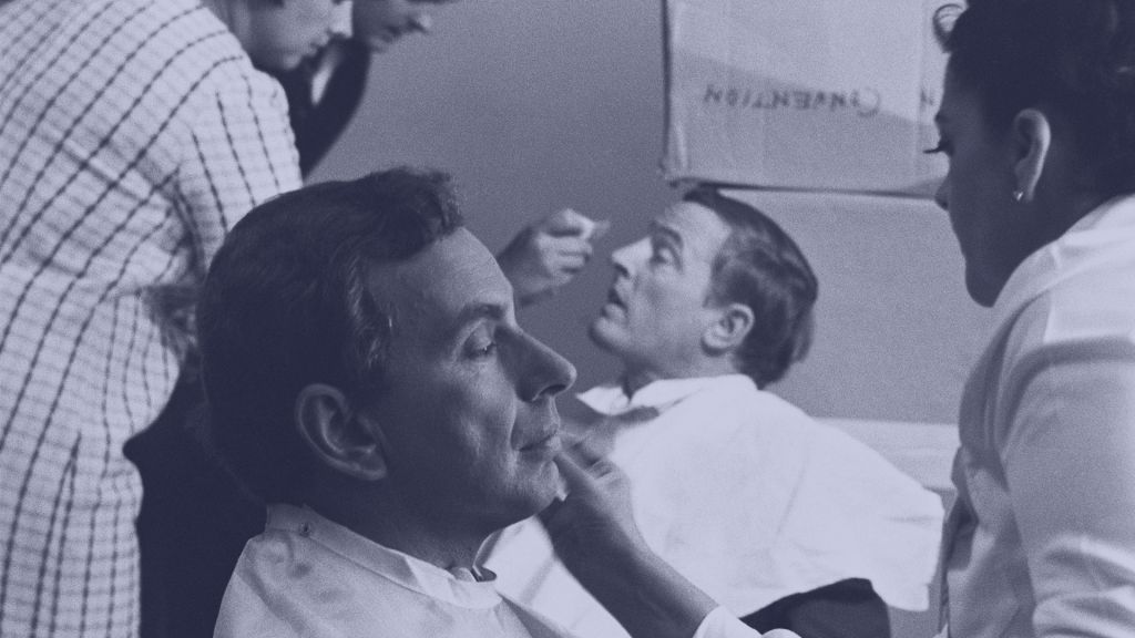 Gore Vidal (front) and William F Buckley (back) are prepped in makeup chairs for their ABC debates