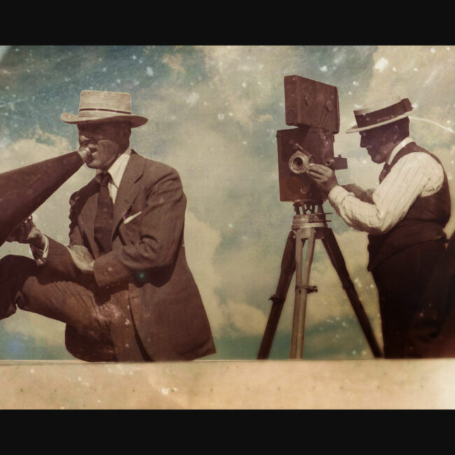 Still from Birth of a Movement, of DW Griffith on set directing a film with megaphone