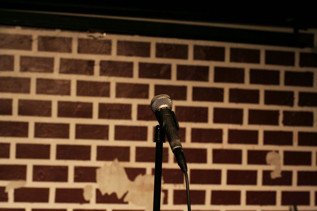 Bricks and a Mic at a comedy club (From "Overload the Machine", a monthly comedy show at The People's Improv Theater.) Image courtesy Benjamin Ragheb on Flickr Commons