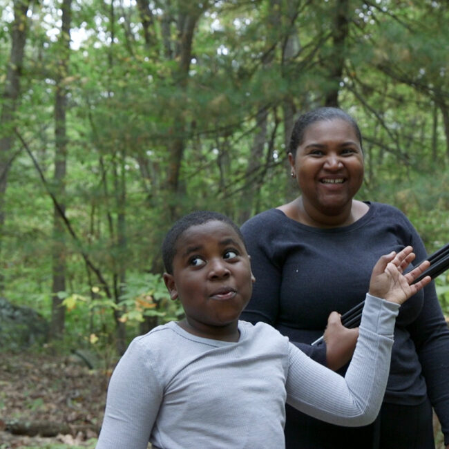 Dasan and his mother out in the woods, from Tre Maison Dasan