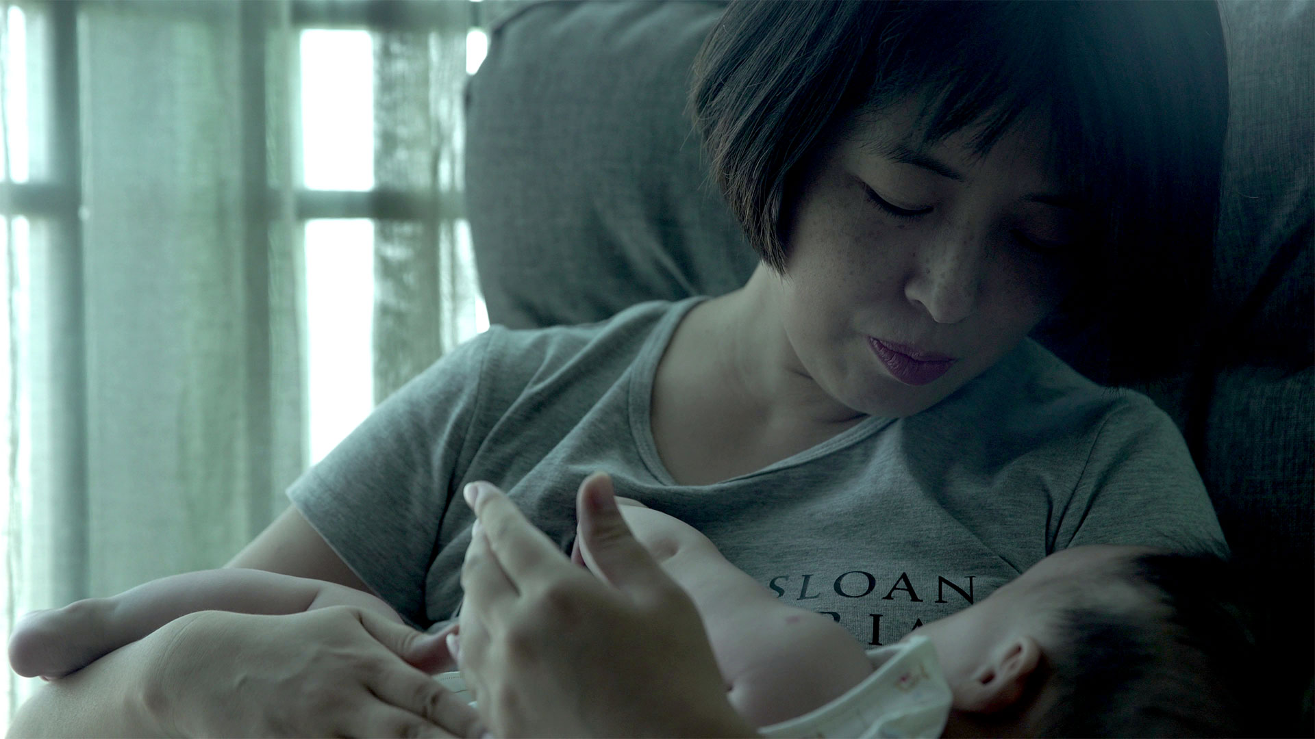 GAI QI and her baby, in Leftover Women