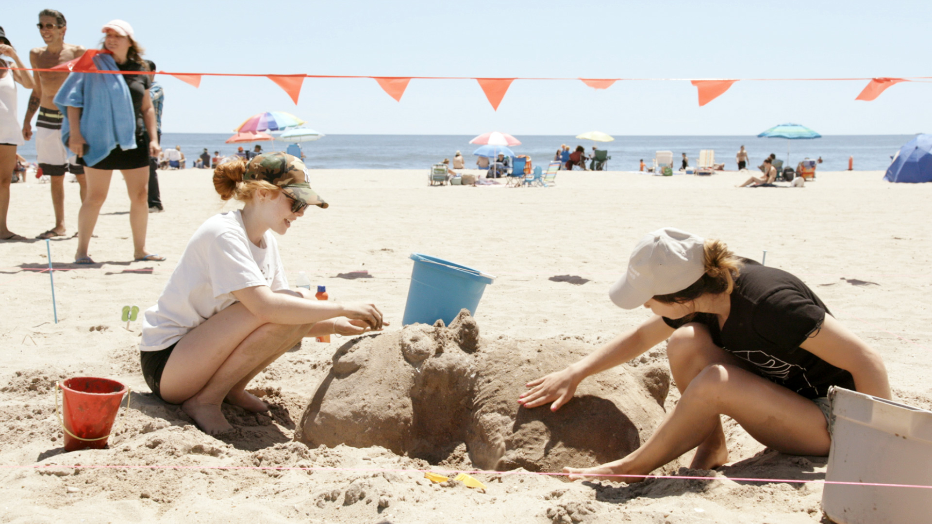 Sandcastle building on beach in New York