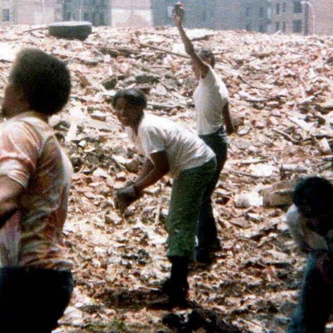 Members of community clear rubble in the Bronx, in Decade of Fire.