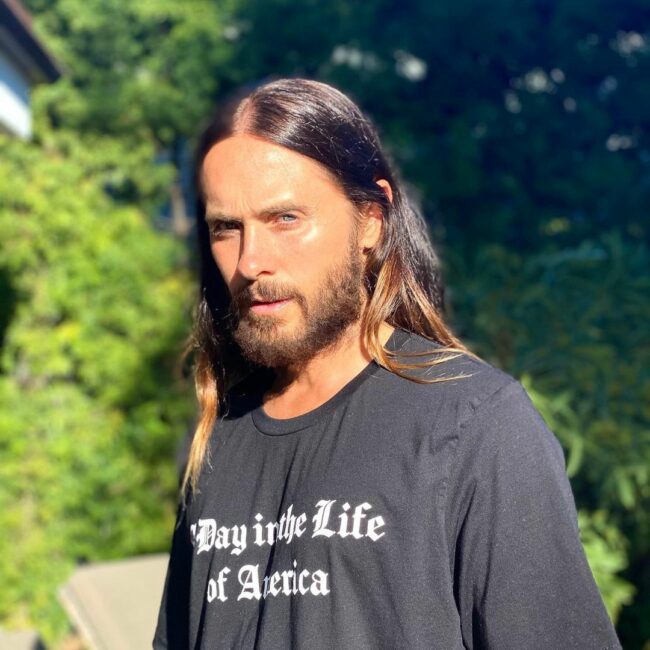 Jared Leto wearing a black Day in the Life of America t-shirt