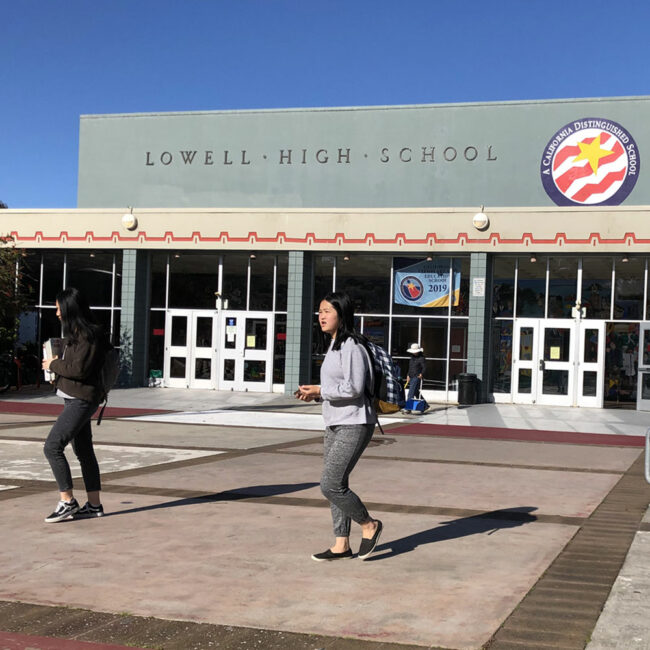 Students at the entrance to Lowell High School