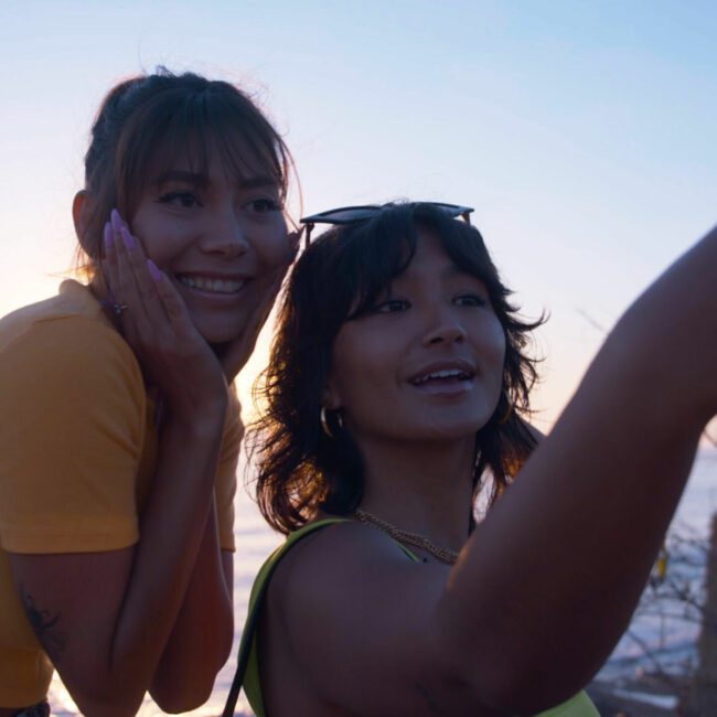 TikTok Influencer Deja Foxx and her sister taking selfie in front of the ocean