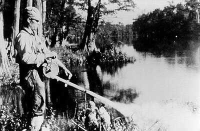 A worker sprays DDT to kill mosquitoes. Earth Timeline 1.jpg