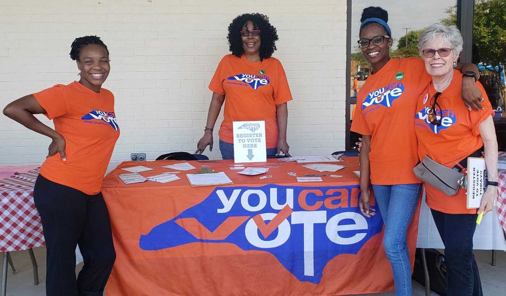 You Can Vote volunteers at a voter registration drive. Photo credit by Kate Fellman Vote-Ground-Truth-N-Carolina-Volunteers.jpg