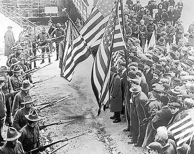 Strikers facing off with militia in Lawrence, MA, PD Mine-Wars-Timeline-3.jpg
