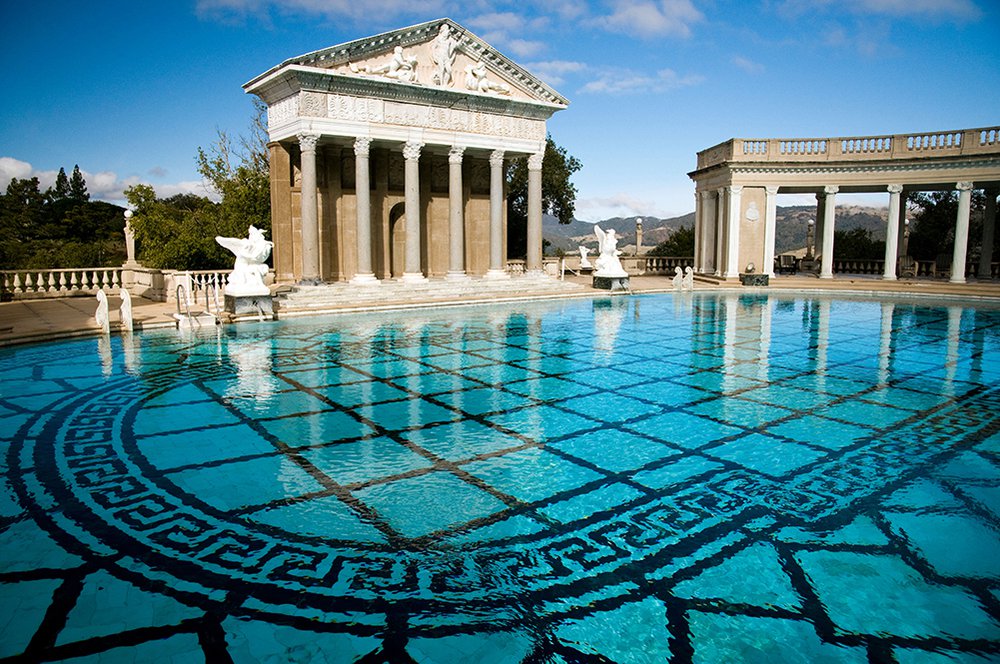 The outdoor, Roman-themed Neptune Pool is lined with marble and includes four Italian relief sculptures on the sides of the colonnades. Photo by Stefano Politi Markovina / Alamy Stock Photo