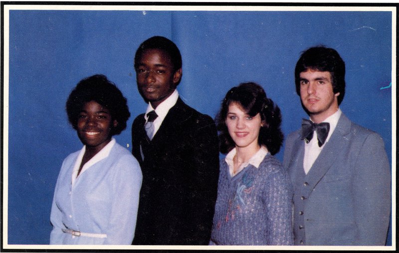 Leland High School Ambassadors Wanda Thomas, Van Poindexter, Felice Walker, and Mike Sudduth. Poindexter went on to be a colonel in the U.S. Army. Image courtesy of Leland Public School District Harvest-Yearbook-Ambassadors.jpg