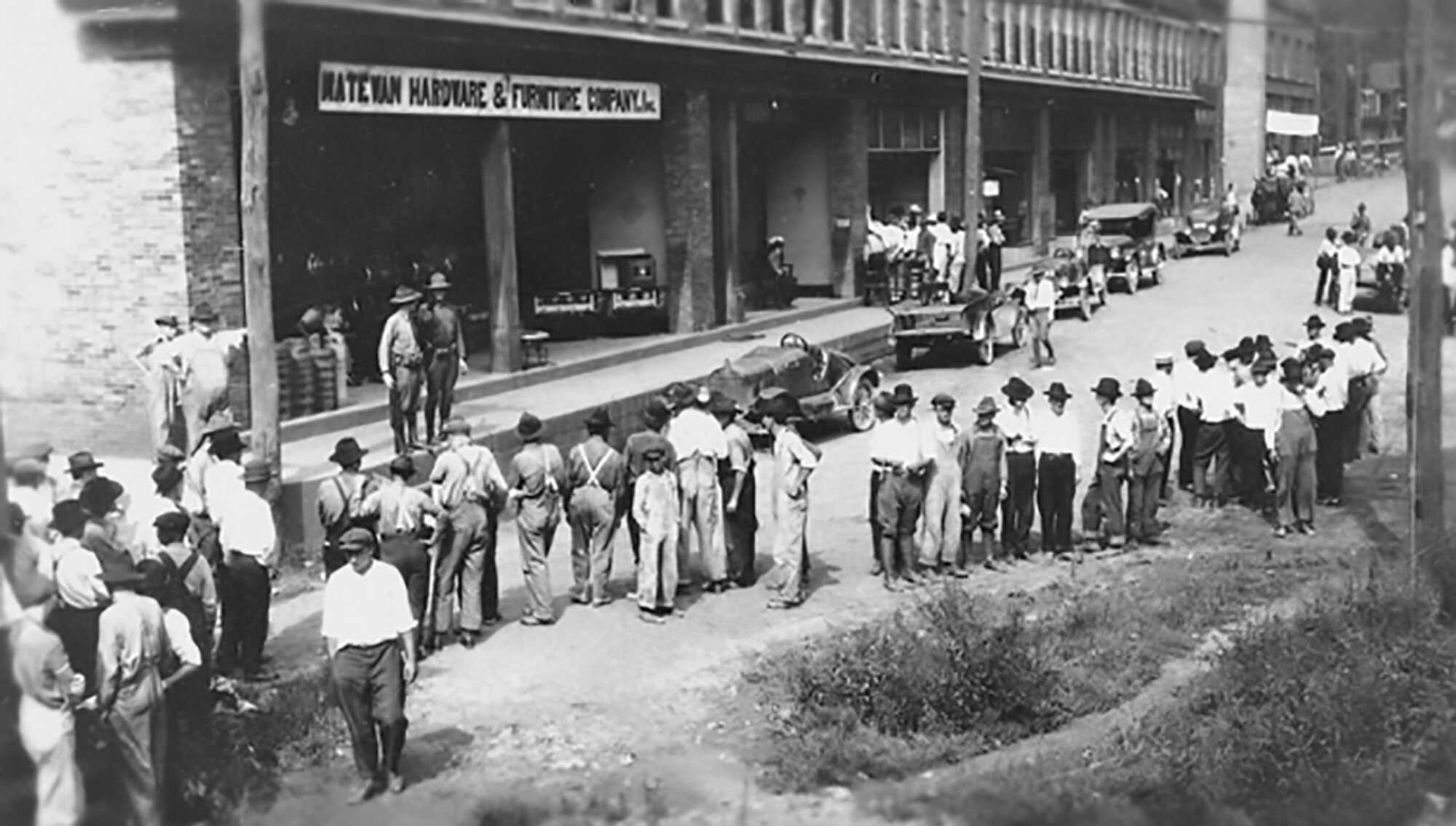Miners line up for strike relief in Matewan, May 1920, Coutesy: WV State Archives, Coal Life Collection Mine-Wars-Timeline-4.jpg