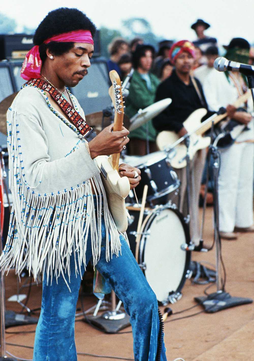 Jimi Hendrix playing his guitar during his set at the Woodstock Music and Art Fair. Playing with Jimi Hendrix is Billy Cox. Photo by Henry Diltz/Corbis via Getty Woodstock-Hendrix-GettyImages-599357656.jpg