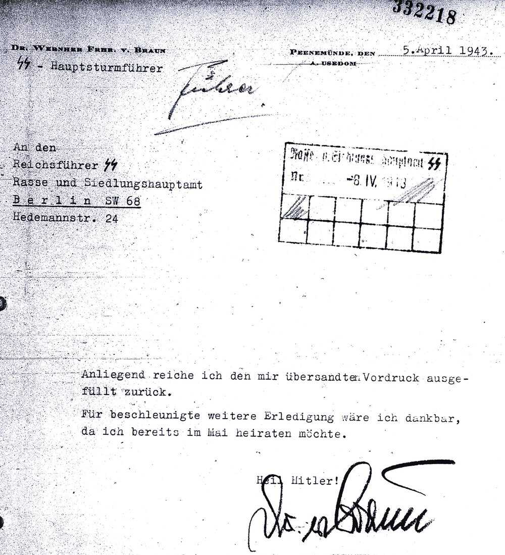 As an SS officer, von Braun requested permission to marry from the Race and Settlement Office, headed by Heinrich Himmler, an architect of the Holocaust. The handwritten “Führer!” on top may come from a Himmler aide. National Archives and Records Admin. CTM-Von-Braun-Nazi-WvB-HH-letter-2.jpg