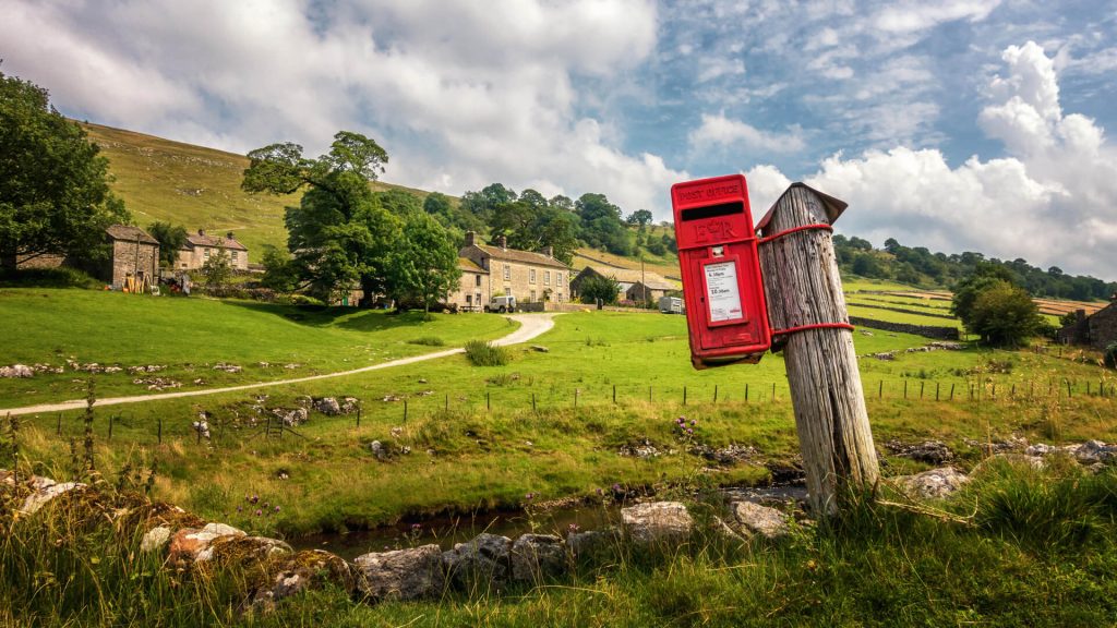 Red postbox in Yorkshire Dales