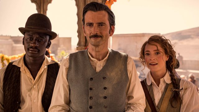 Actors Ibrahim Koma, David Tennant and Leonie Benesch in a scene from Around the World in 80 Days on PBS MASTERPIECE.