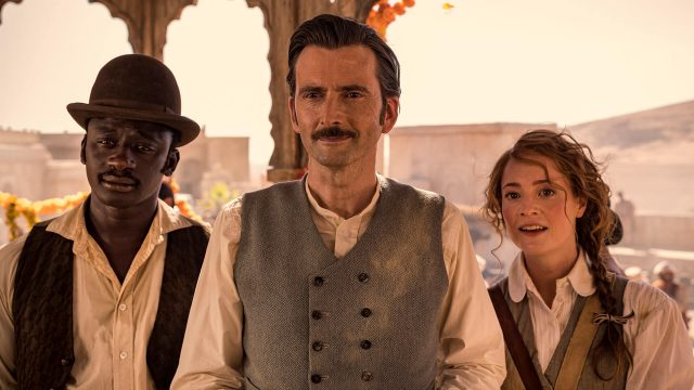 Actors Ibrahim Koma, David Tennant, Leonie Benesch (left to right) star in a scene from Around the World in 80 Days on PBS MASTERPIECE.