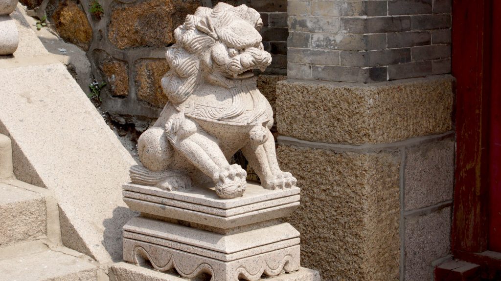 Statue of Chinese guardian lion or Foo Dog.