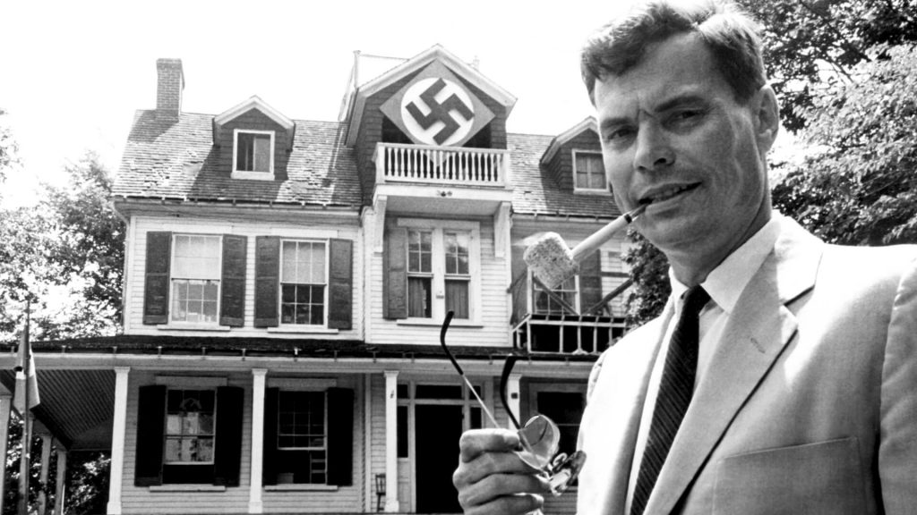 American Nazi leader George Lincoln Rockwell in front of party headquarters, 1965