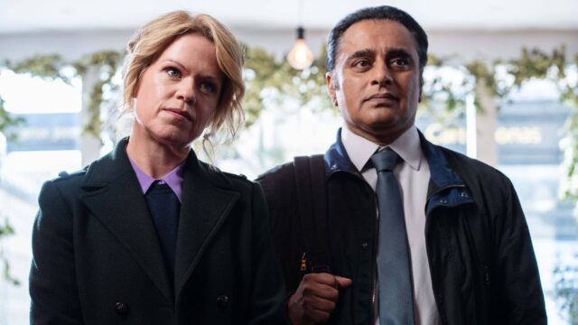 Sinéad Keenan and Sanjeev Bhaskar standing together in Unforgotten Season 5