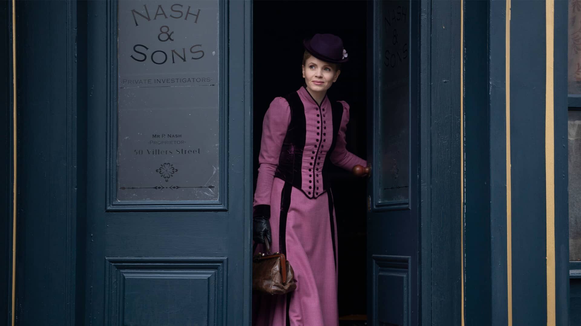 Kate Phillips as Eliza Scarlet leaving Nash & Sons office in Miss Scarlet and The Duke Season 4