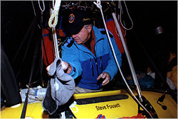 Steve Fossett preparing balloon gondola for flight