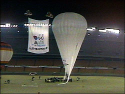 Fossett balloon being filled in stadium