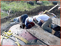 Photo of team moving the Moai mold