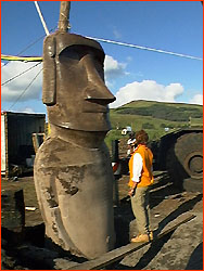 Photo of Jo Anne inspecting the moai