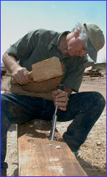 Rick with mallet and chisel