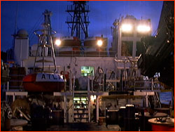 Working on the buoys on the Ka'imi's deck at dusk