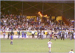 When a fire broke out during a football match in England, there was little reaction from the nearby crowd who watched as it grew.