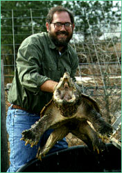 David Rostal holding snapping turtle