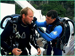 Howard and Bob putting on rebreathers