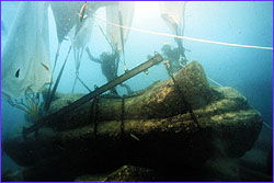 Lifting block underwater with air-filled bags