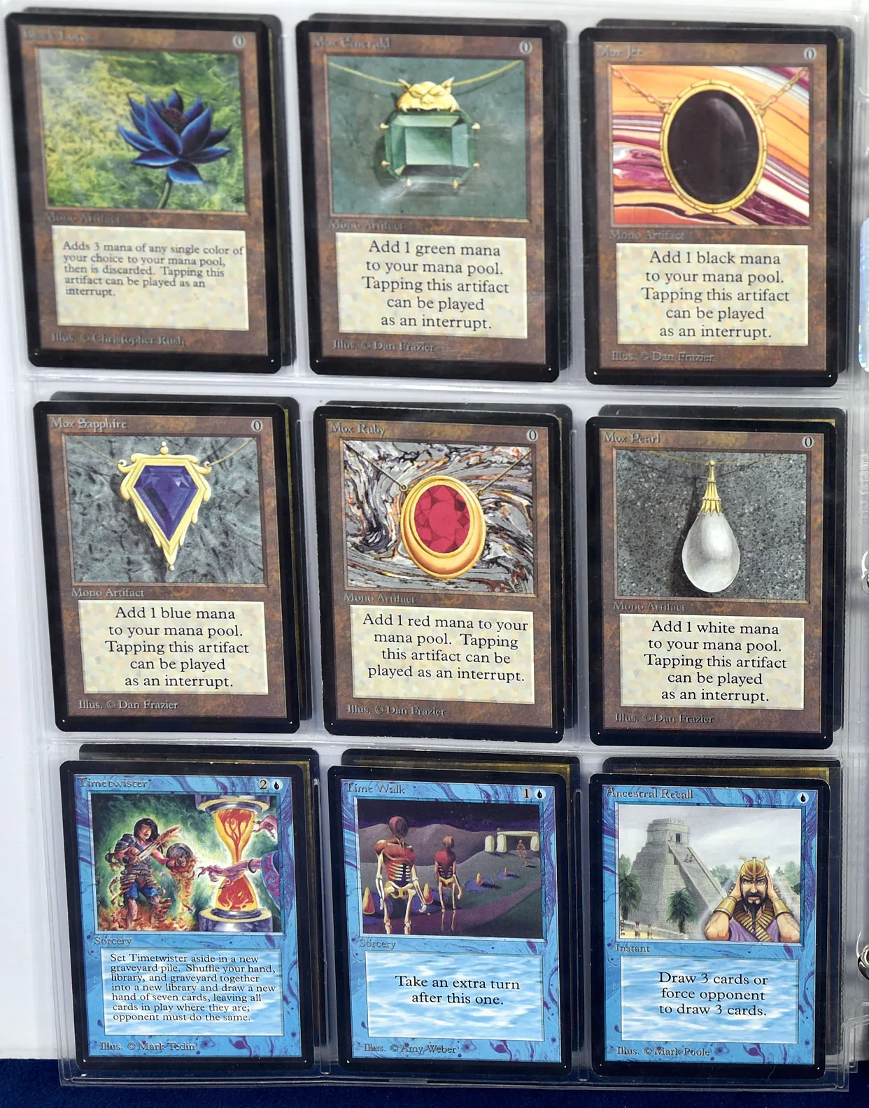 An album of Magic the Gathering trading cards