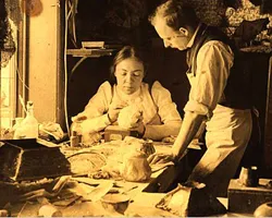 Clara Driscoll in a Tiffany Studios workroom with another Tiffany employee, Joseph Briggs, ca. 1901. (Image and description from Wikimedia Commons)